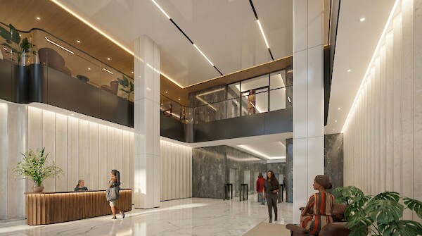 The expansive, reimagined lobby at 260 Madison Avenue features double-height ceilings, premium white marble finishes, and a sophisticated mezzanine—setting a new standard for office arrivals in Midtown.