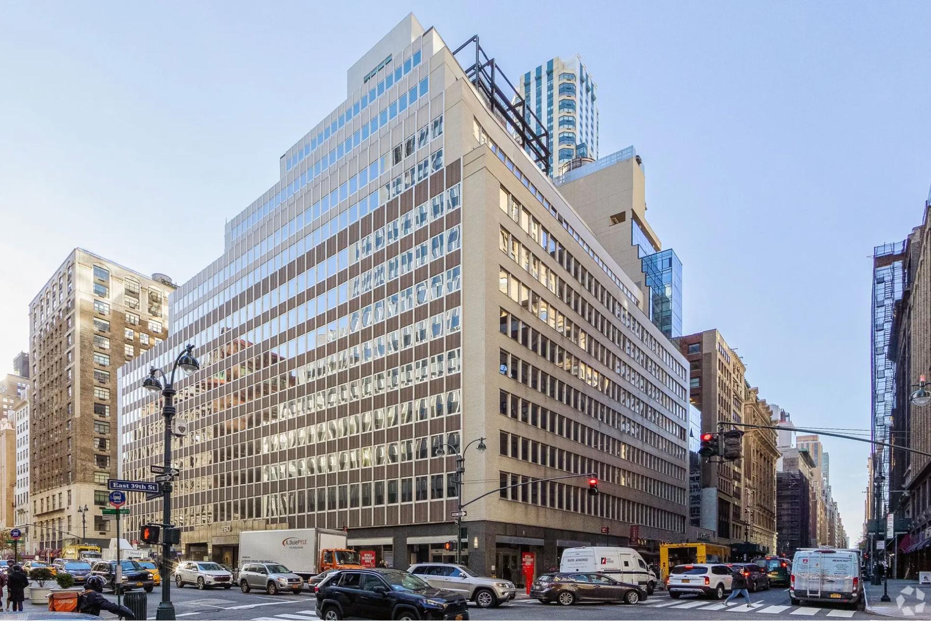 AmTrustRe to buy midtown Manhattan office tower for $217 million